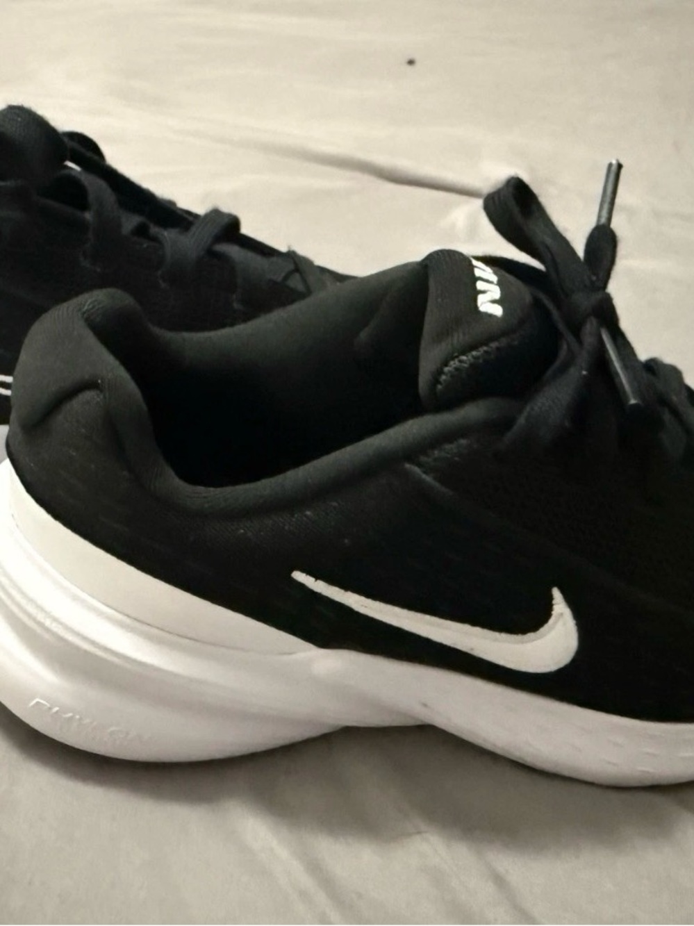 Nike Women's Black and White Low-Top Running Shoes